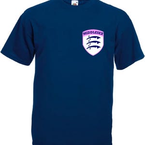 May include: A navy blue t-shirt with a pink and blue Middlesex County Council crest on the front.
