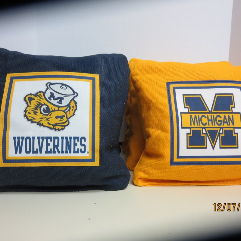 thumbnail interactive-video image 1 of Michigan Wolverines Vs Michigan State Spartans Cornhole Bean Bags – Set Of 8 All-Weather Bags 1 of 6