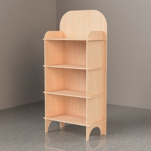 May include: A light wood shelf unit with three shelves and a rounded top. The shelf unit is freestanding and has a natural wood finish.