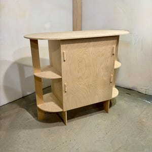 Comptoir de kiosque pop-up emballé à plat avec double extrémité arrondie pour les écrans modernes de vente au détail et de boutique