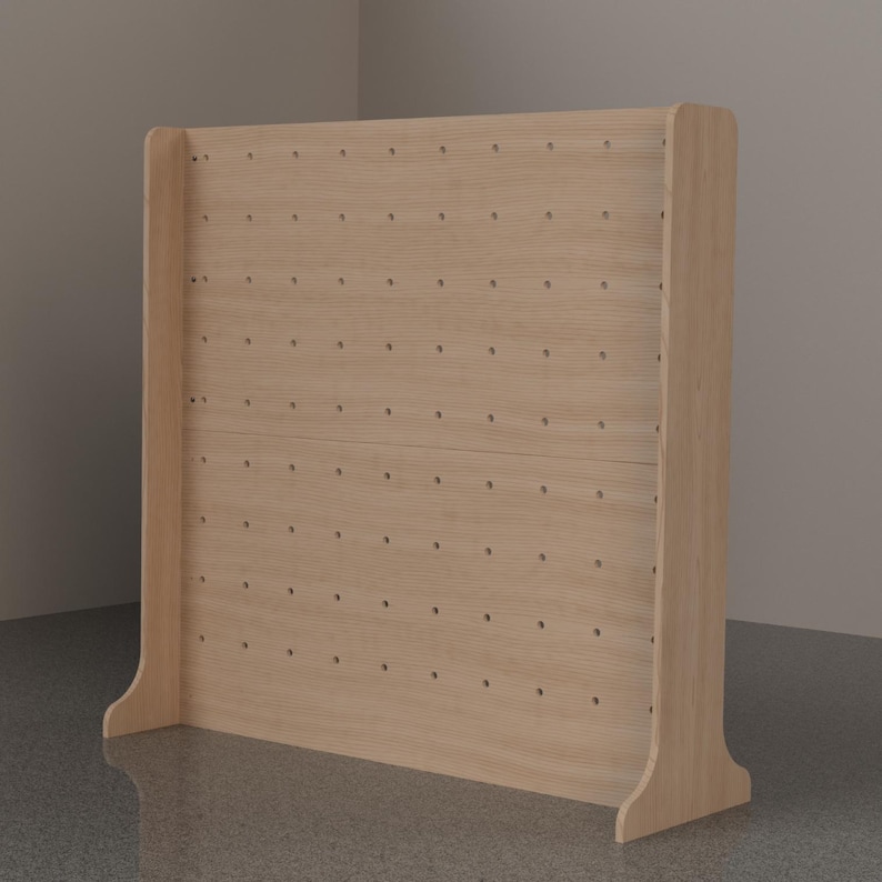 May include: A light-colored wooden pegboard display stand featuring a rectangular panel with a grid of evenly spaced circular holes. The structure includes two side supports with curved bases, providing stability for the upright wooden board.