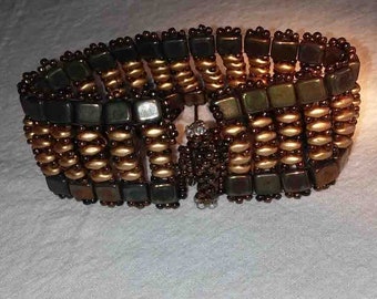 Brown and gold beaded cuff bracelet with handmade toggle clasp
