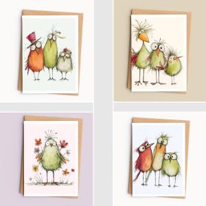 May include: Four greeting cards featuring watercolor illustrations of birds with large eyes and messy feathers. The cards depict various groupings of colorful birds, including some wearing hats or standing among flowers, each paired with a brown envelope.