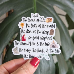 May include: White sticker with the text "I am... The bread of life, The light of the world, The door of the sheep, The good shepherd, The resurrection & the life, The way, The truth, & the life, The true vine." Includes illustrations of a loaf of bread, a lightbulb, a door, and more.