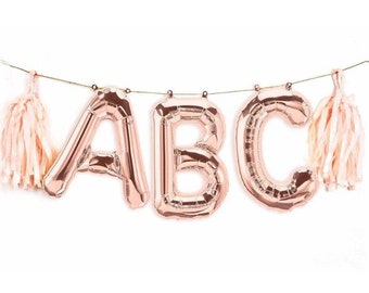 Copper 2024 letter balloons