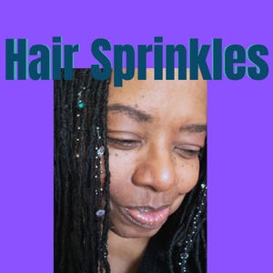 May include: A person with black dreadlocks adorned with decorative hair accessories. The image features the text "Hair Sprinkles" in a teal font against a purple background. The person is looking down with a slight smile.