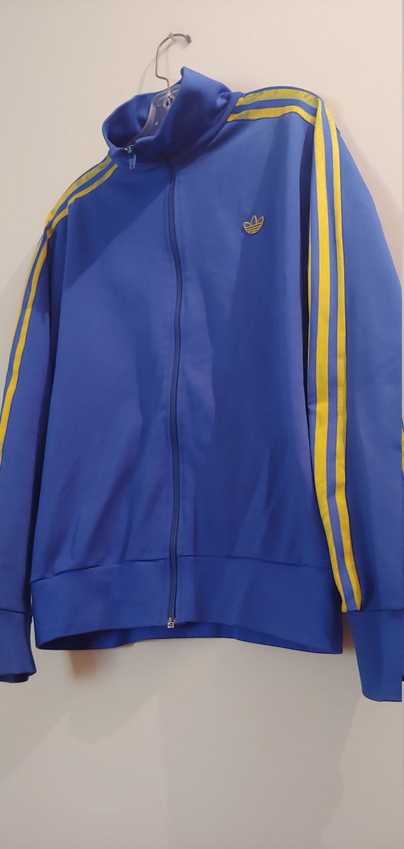blue and yellow adidas jacket