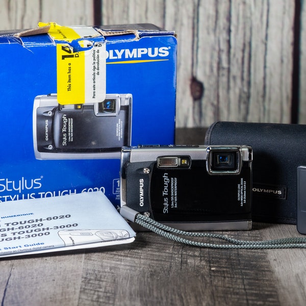 Olympus Stylus Tough-6020 Digital Camera Digicam (Black) In Box with Manuals, case, battery, and charger