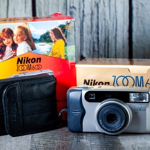 Nikon Zoom 600 / 38-110mm zoom - macro lens / In Original Box with Leather case - point and shoot with Film Included