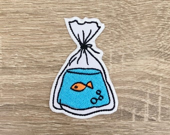 Goudvis in tas geborduurde opstrijkpatch, cartoonappliqué