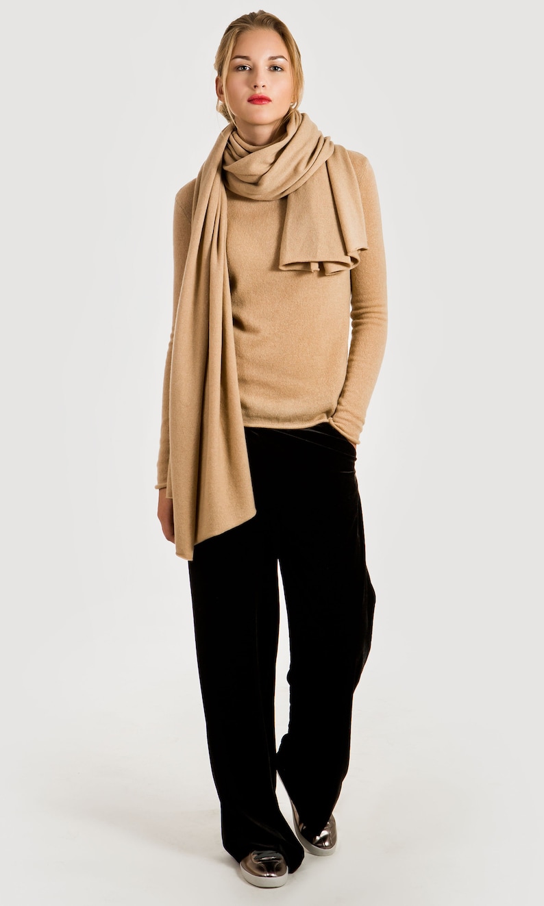 Oversized cashmere shawl draped elegantly over shoulders