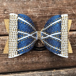 Navy gold and white criss cross rhinestone dolly cheer bow