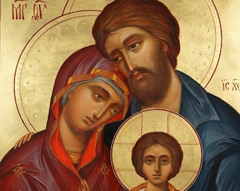 May include: A traditional religious icon depicting the Holy Family. The icon features a gold background with a red border. The figures of Mary, Joseph, and Jesus are painted in a realistic style with detailed features. The icon is framed in a simple wooden frame.