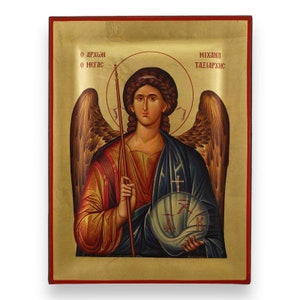 May include: A hand-painted icon of the Archangel Michael, depicted with wings, a spear, and a shield. The icon is set against a gold background with a red frame. The text "O ARCHON O MEGAS" and "MICHANA TAZIARCHNS" is written in Greek at the top of the icon.