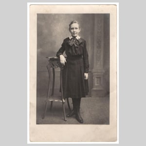 Antique rppc - Young girl studio portrait period dress - Vintage German black and white private real photo postcard ca 1915