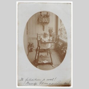 Antique rppc - Cute little girl in highchair sepia portrait - Vintage Belgian black and white private photo postcard ca 1910