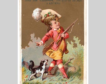 ca. 1890 - Meisje gaat op jacht naar een hond, verguld verzamelkaartje - Victoriaanse lithografie, België