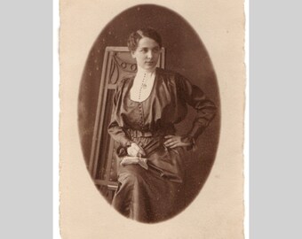 Antique rppc - Woman lady amazing period outfit dress sat in old chair - Vintage sepia private photo postcard 1916