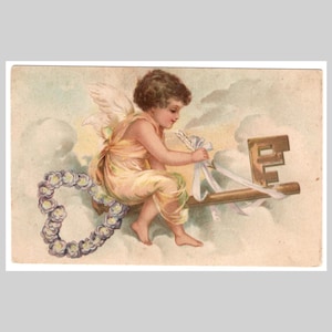 Vintage angel postcard - Cherub rides a key ribbons clouds heart unused - Antique gilded German illustrated greeting card ca 1900