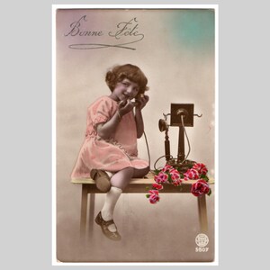 Antique RPPC - Young girl child makes a phonecall telephone - Vintage Belgian art deco hand tinted real photo postcard greeting card ca 1925