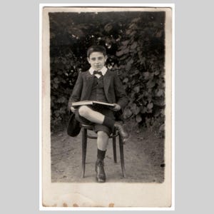 Antique rppc - Schoolboy boy with book portrait - Vintage Belgian private real photo postcard ca 1915