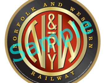 May include: A round, gold-coloured ornament with a black and red circle in the centre. The circle features the letters "N&W" in gold, with "RY" in smaller gold letters below. The text "Norfolk and Western Railway" is written in a gold circle around the centre circle.