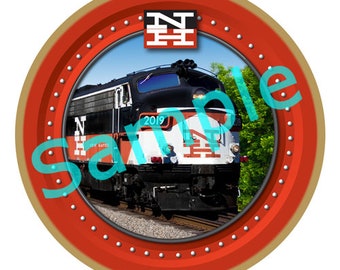 May include: A red and gold round bauble featuring a black and white train with the New Haven Railroad logo and the year 2019. The bauble has a gold hanger.