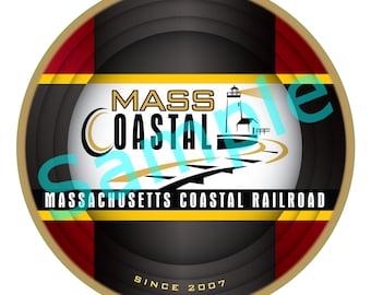 May include: A round, gold-rimmed logo with a black and white image of a lighthouse and railway tracks. The text "MASS COASTAL MASSACHUSETTS COASTAL RAILROAD SINCE 2007" is printed in yellow and black.