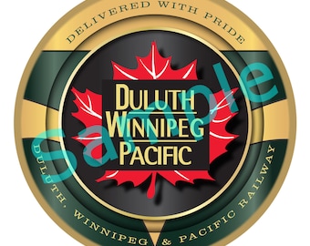 May include: A gold round metal ornament with the text "Delivered with Pride" and "Duluth, Winnipeg & Pacific Railway" around the edge. The centre features a red maple leaf with the text "Duluth Winnipeg Pacific" in a black box.