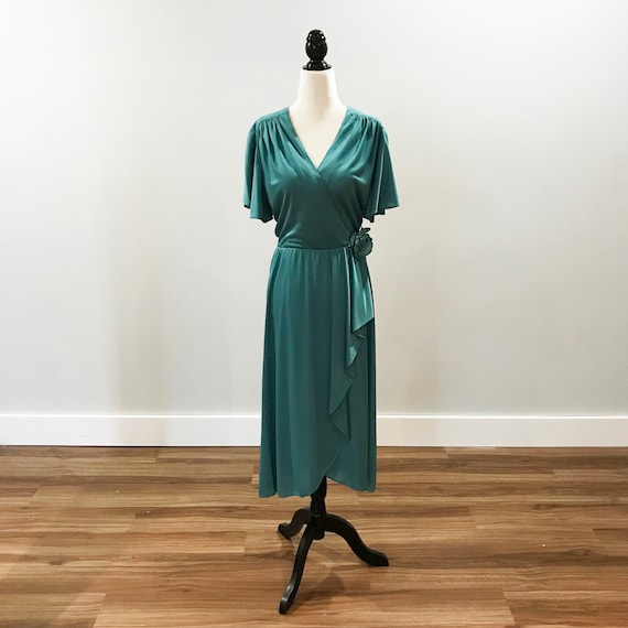 1970s wrap front dress in soft green