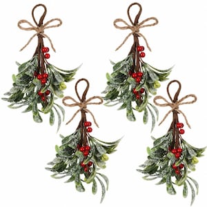 May include: A set of four artificial mistletoe bundles, each featuring green leaves with a frosted finish, clusters of small red berries, and a brown stem tied with a natural jute twine bow at the top for hanging as a decorative ornament.
