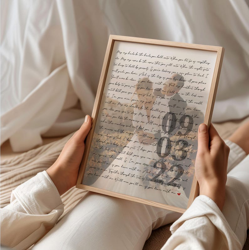 May include: A framed print with a handwritten message about love and commitment. The print features a couple in the background, and the date 09 03 22 is visible in the foreground.