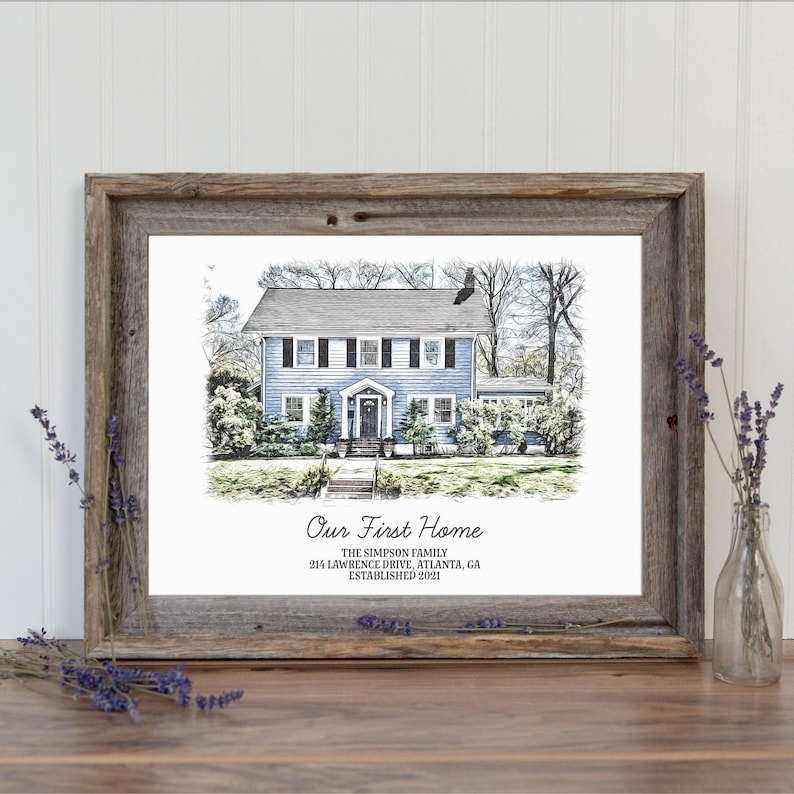 May include: A black and white sketch of a blue house with white trim. The house has a white front door and a white porch. The house is surrounded by trees and bushes. The text "Our First Home" is below the house, along with the family name, address, and the year the house was established.