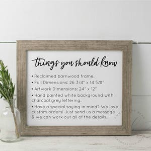 May include: A framed sign with the text "things you should know" and details about the frame and artwork dimensions. The frame is made of reclaimed barnwood and has a white background with charcoal grey lettering. The artwork dimensions are 24 inches by 12 inches.