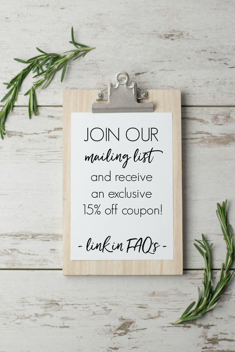 May include: A white clipboard with a wooden frame and a silver clip. The clipboard has a white paper with black text that reads "JOIN OUR mailing list and receive an exclusive 15% off coupon! - link in FAQ's -"