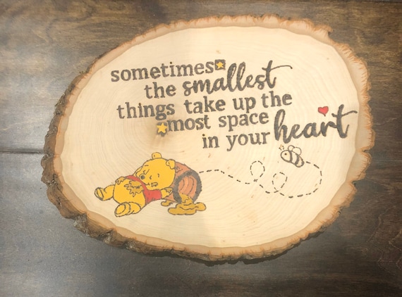 Winnie the Pooh inspired wood burning art.