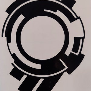 May include: Black and white geometric design with a circular shape in the center. The design resembles a stylized number nine.