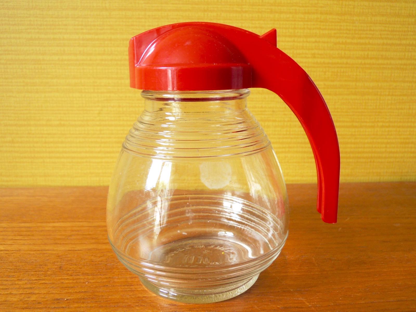Ancienne saupoudreuse 50s en verre ciselé avec bouchon en bakélite
