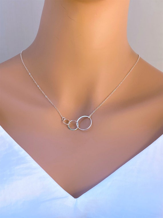 Tashi Tiny Interlocking Circle Necklace Sterling Silver | Blue Ruby  Jewellery