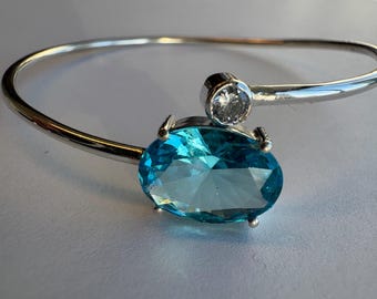 Blue topaz and white topaz sterling silver bracelet