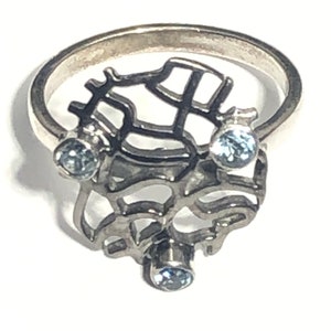 Bague en argent sterling avec topaze bleue