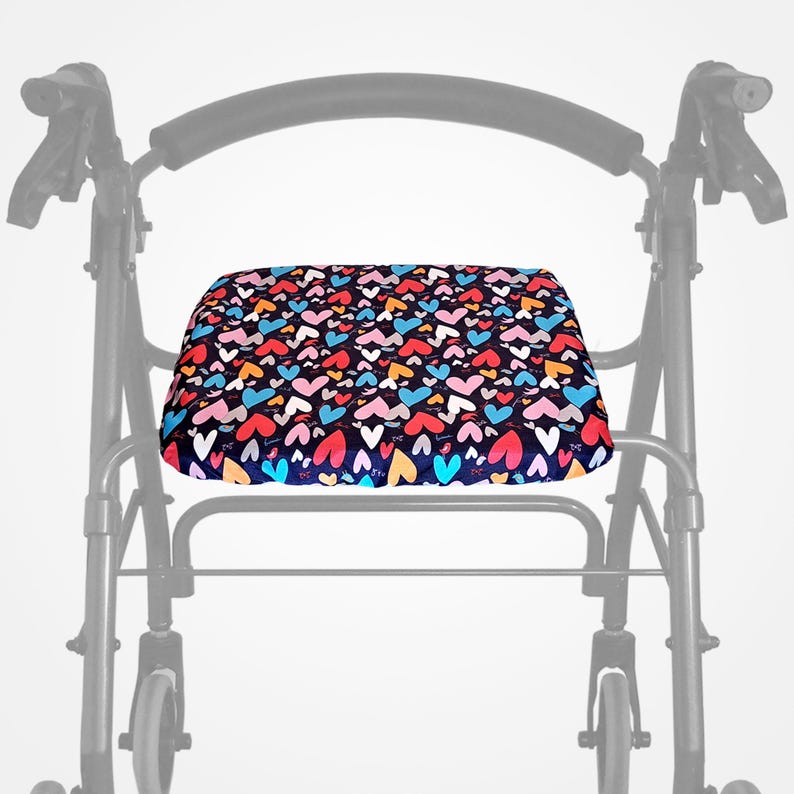 May include: A black walker with a colorful heart-patterned seat cushion. The cushion is made of soft fabric and provides extra comfort for sitting.
