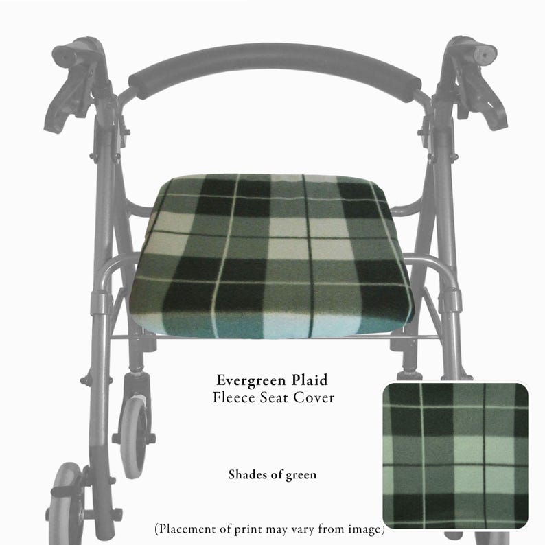 Puede incluir: Una funda de asiento de forro polar con estampado de cuadros en tonos verde bosque, con cuadrados oscuros y claros separados por finas l&iacute;neas blancas. La funda se muestra sobre el asiento de un andador negro, junto a una muestra de tela.