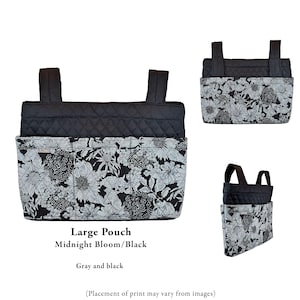 May include: A large pouch featuring a black and gray floral pattern on the lower section and a solid black quilted upper section with two vertical straps. The text reads Large Pouch Midnight Bloom/Black and Gray and black. Placement of print may vary.