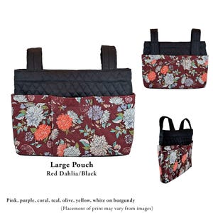May include: A large pouch featuring a quilted black upper section and a burgundy lower section with a floral print in pink, purple, coral, teal, olive, yellow, and white. The pouch includes two black straps and three front pockets. Text reads: Large Pouch Red Dahlia/Black.