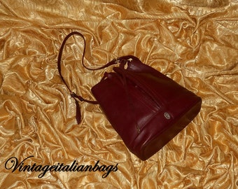 Concorde leather handbag Louis Vuitton Burgundy in Leather - 24990168
