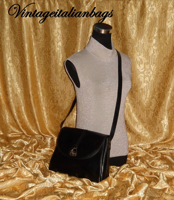 Vintage Gucci black leather shoulder bag with golden and silver
