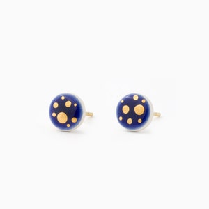 Stunning dark blue stud earrings with gold spots. Small 8mm in diameter.