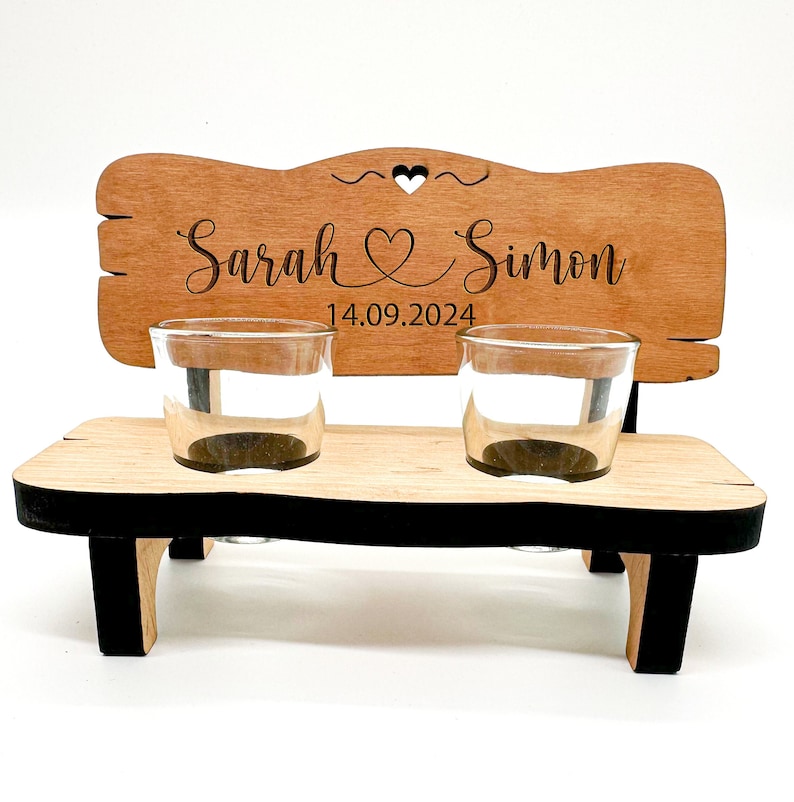 May include: Wooden bench with two shot glasses, personalised with the names "Sarah & Simon" and the date "14.09.2024".