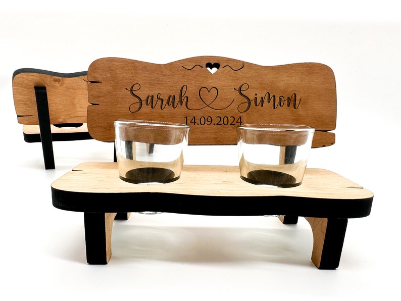 May include: Wooden bench with two shot glasses, personalised with the names "Sarah & Simon" and the date "14.09.2024".